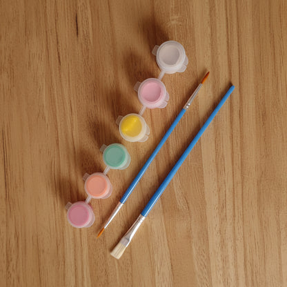Add a paint brush and pots.